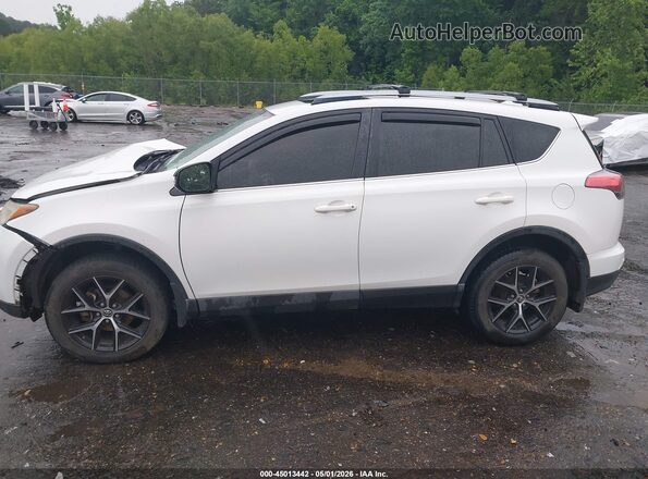 JTMNFREV9JD123755 2018 TOYOTA RAV4 Белый Вид задней части салона