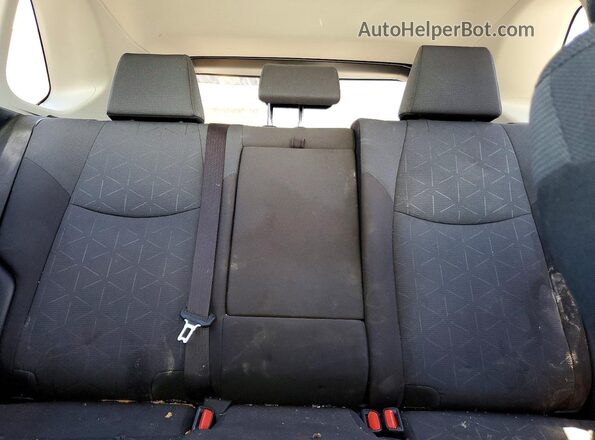 JTMP1RFV2KD502362 2019 TOYOTA RAV4 Silver Vista de los asientos traseros