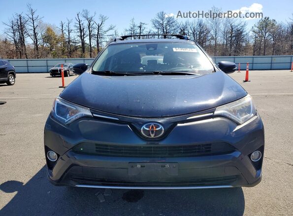 JTMRFREV0HJ700346 2017 TOYOTA RAV4 Teal Front view