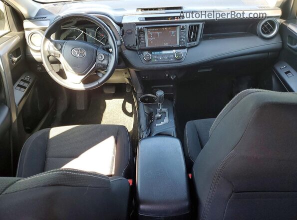 JTMRFREV0HJ700346 2017 TOYOTA RAV4 Teal Dashboard view