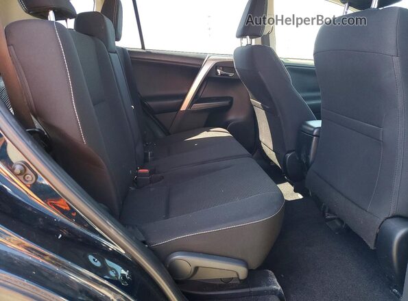 JTMRFREV0HJ700346 2017 TOYOTA RAV4 Teal Rear interior view