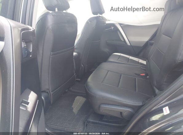 JTMRFREV1HJ712229 2017 TOYOTA RAV4 Gray Vista de la etiqueta del VIN
