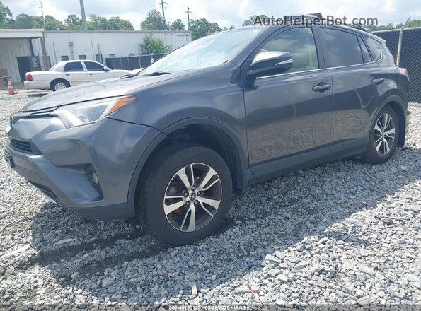 JTMRFREV1HJ712229 2017 TOYOTA RAV4 Gray Vista tres cuartos delantera izquierda