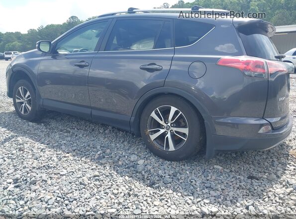 JTMRFREV1HJ712229 2017 TOYOTA RAV4 Gray Trasero izquierdo