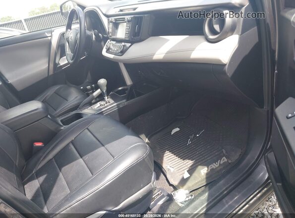 JTMRFREV1HJ712229 2017 TOYOTA RAV4 Gray Vista interior delantera