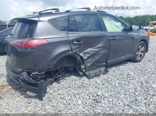 JTMRFREV1HJ712229 2017 TOYOTA RAV4 Gray Trasero derecho