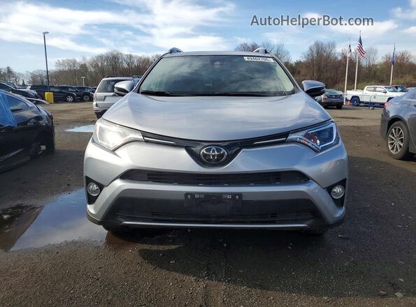 JTMRFREV4JD247420 2018 TOYOTA RAV4 Серебряный Вид спереди