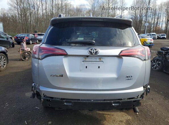 JTMRFREV4JD247420 2018 TOYOTA RAV4 Серебряный Вид сзади