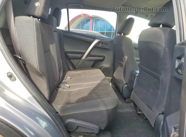 JTMRFREV4JD247420 2018 TOYOTA RAV4 Серебряный Вид задней части салона