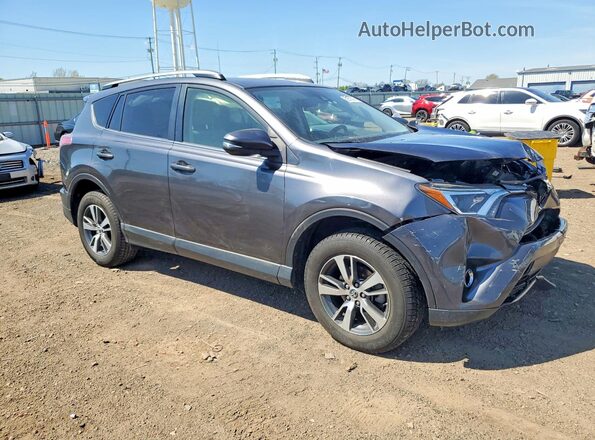 JTMRFREV4JJ251923 2018 TOYOTA LE Серый Передняя правая четверть