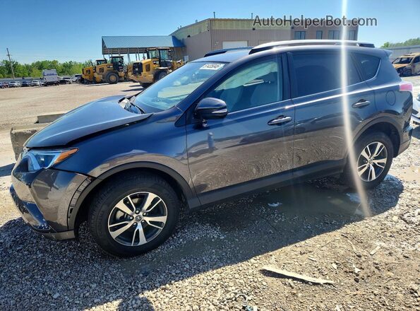 JTMRFREV4JJ723229 2018 TOYOTA RAV4 Gray Vista tres cuartos delantera izquierda