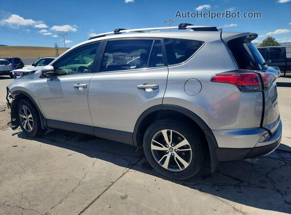 JTMRFREV5JJ211172 2018 TOYOTA RAV4 Серебряный Задняя левая четверть