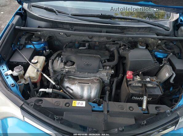 JTMRFREV6HJ173123 2017 TOYOTA RAV4 Blue Widok z tyłu