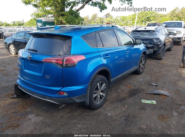 JTMRFREV6HJ173123 2017 TOYOTA RAV4 Blue Tył prawy