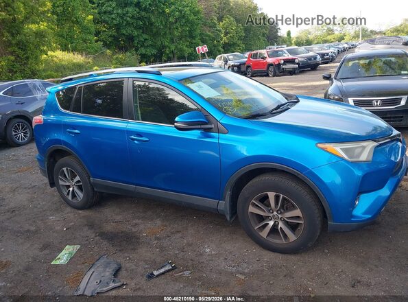 JTMRFREV6HJ173123 2017 TOYOTA RAV4 Blue Widok wnętrza z tyłu