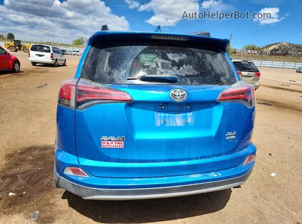 JTMRFREV6JD231476 2018 TOYOTA RAV4 Blue Вид ззаду