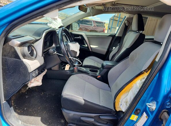 JTMRFREV6JD231476 2018 TOYOTA RAV4 Blue Вид салону спереду