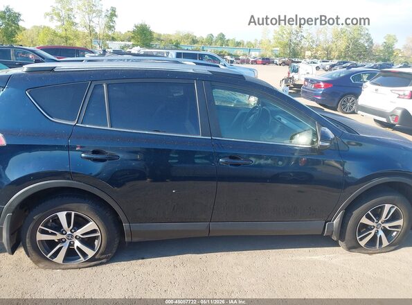 JTMRFREV7HJ706323 2017 TOYOTA LE Black Вид задньої частини салону