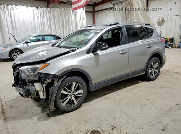 JTMRFREV7JJ255626 2018 TOYOTA RAV4 Серебряный Передняя левая четверть