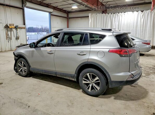 JTMRFREV7JJ255626 2018 TOYOTA RAV4 Серебряный Задняя левая четверть