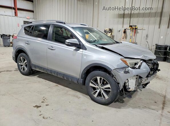 JTMRFREV7JJ255626 2018 TOYOTA RAV4 Серебряный Передняя правая четверть