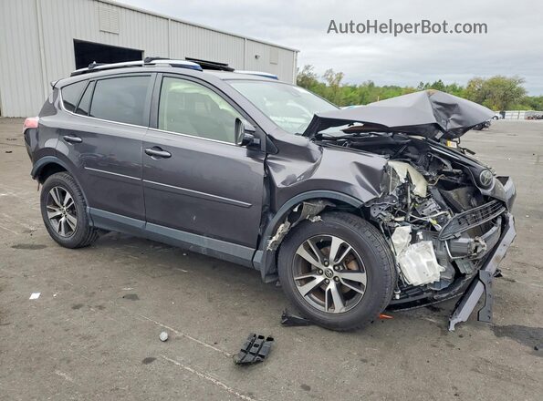 JTMRFREV8HJ129852 2017 TOYOTA RAV4 Gray Front right