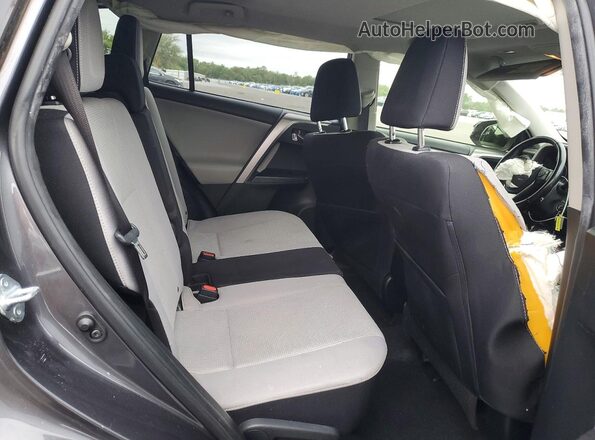 JTMRFREV8HJ129852 2017 TOYOTA RAV4 Gray Rear seats view