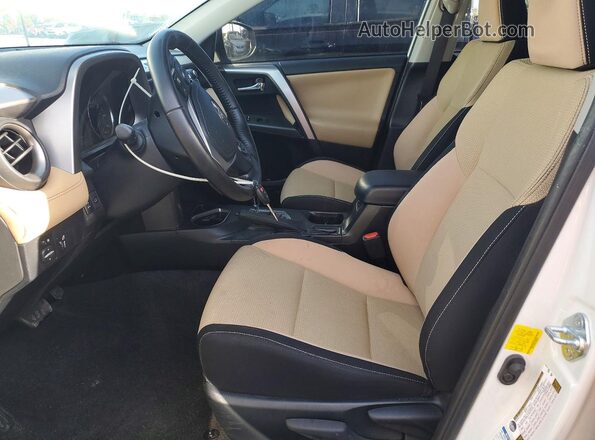 JTMRFREV9GJ068820 2016 TOYOTA RAV4 Белый Вид салона спереди