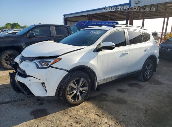 JTMRFREV9GJ068820 2016 TOYOTA RAV4 Белый Передняя левая четверть