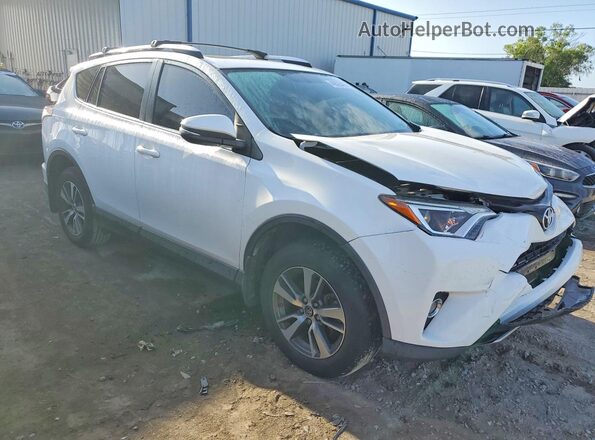 JTMRFREV9GJ068820 2016 TOYOTA RAV4 Белый Передняя правая четверть