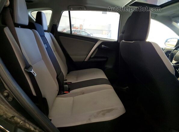 JTMRJREV2GD017740 2016 TOYOTA RAV4 Черный Вид задней части салона
