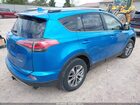 2018 Toyota Rav4 Hybrid Le Blue vin: JTMRJREV3JD245799