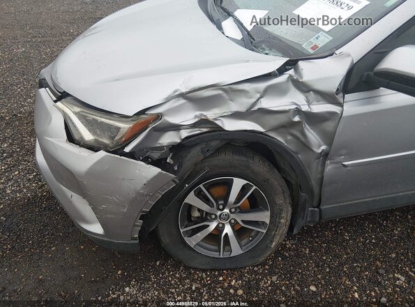 JTMWFREV1JD116092 2018 TOYOTA LE Серебряный Вид спереди