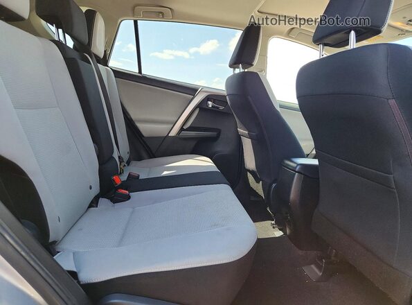 JTMWFREV2JJ200178 2018 TOYOTA RAV4 Silver Вид задньої частини салону