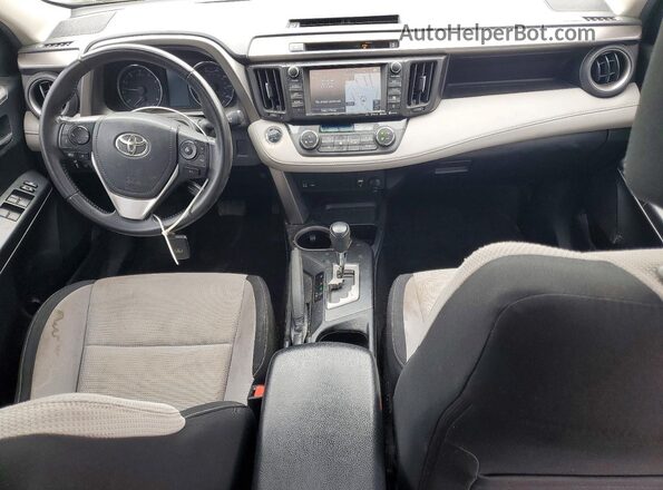 JTMWFREV3GJ067715 2016 TOYOTA RAV4 White Widok deski rozdzielczej
