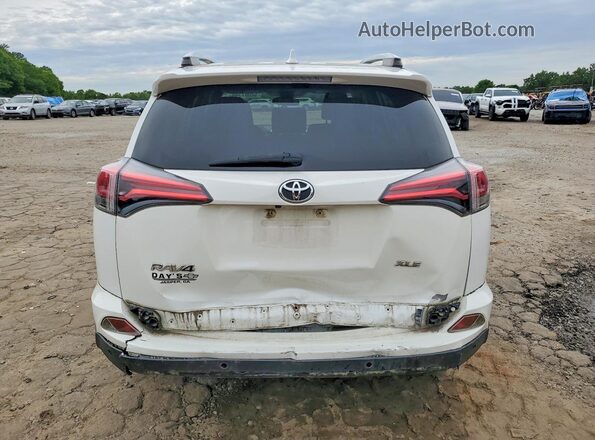JTMWFREV3GJ067715 2016 TOYOTA RAV4 White Widok z tyłu