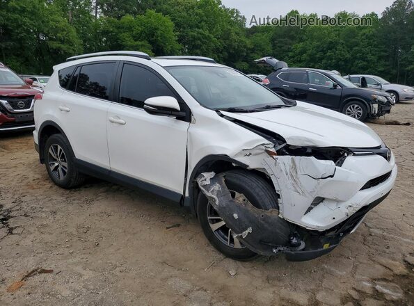 JTMWFREV3GJ067715 2016 TOYOTA RAV4 White Przód prawy