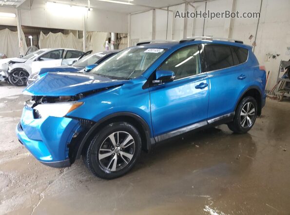 JTMWFREV3GJ098690 2016 TOYOTA RAV4 Blue წინა მარცხენა ხედი სამი მეოთხედიდან