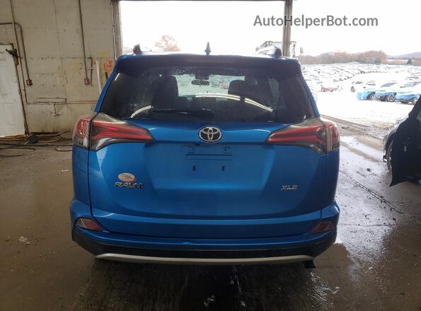 JTMWFREV3GJ098690 2016 TOYOTA RAV4 Blue უკანა ხედი