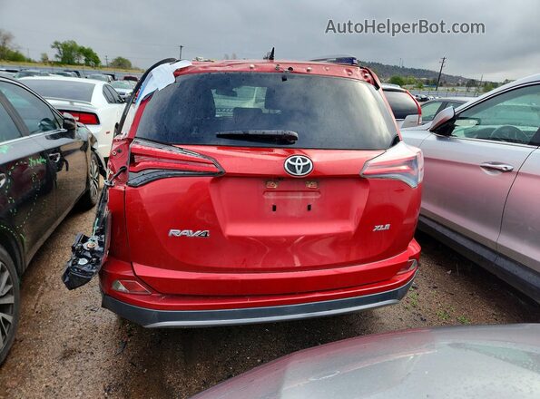 JTMWFREV6HJ117976 2017 TOYOTA RAV4 Red უკანა ხედი