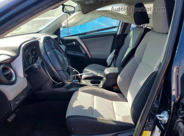 JTMWFREV9JJ205393 2018 TOYOTA RAV4 Синий Вид салона спереди
