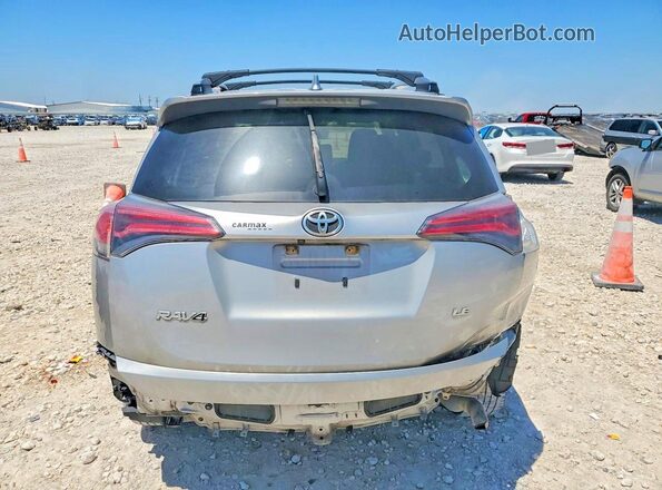JTMZFREV1JJ198128 2018 TOYOTA RAV4 Silver Widok z tyłu