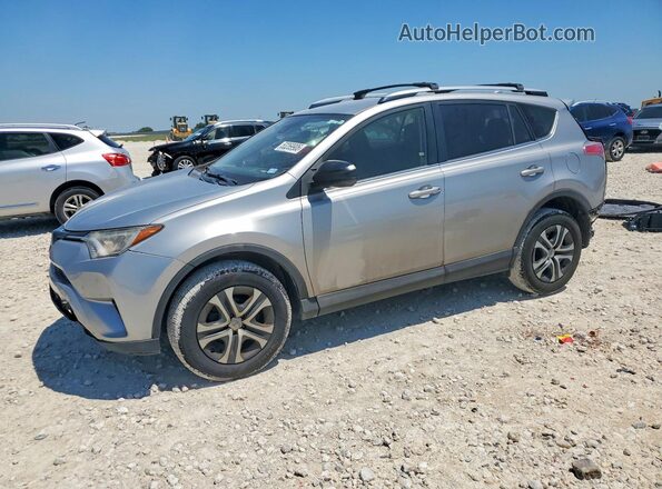 JTMZFREV1JJ198128 2018 TOYOTA RAV4 Silver Przód lewy