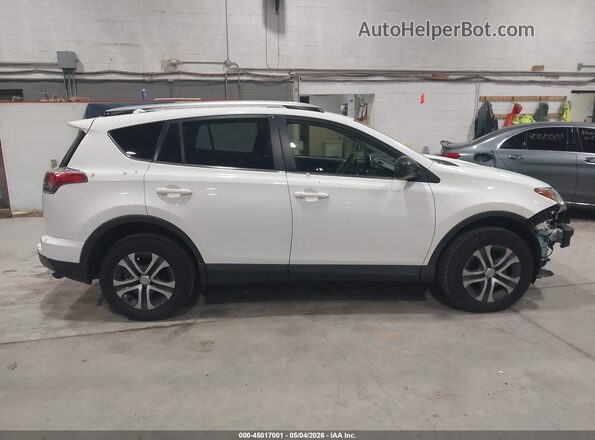 JTMZFREV2HJ105787 2017 TOYOTA LE Белый Вид задней части салона