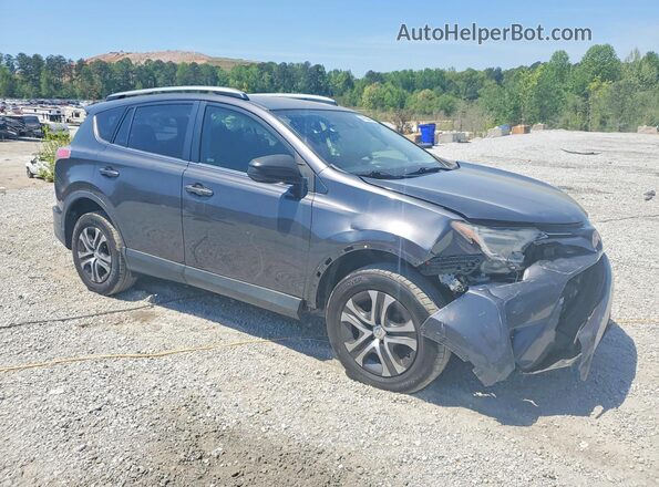 JTMZFREV2HJ721442 2017 TOYOTA RAV4 Gray Front right
