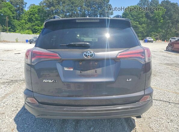 JTMZFREV2HJ721442 2017 TOYOTA RAV4 Gray Rear view
