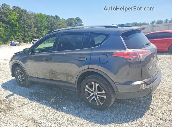 JTMZFREV2HJ721442 2017 TOYOTA RAV4 Gray Rear left