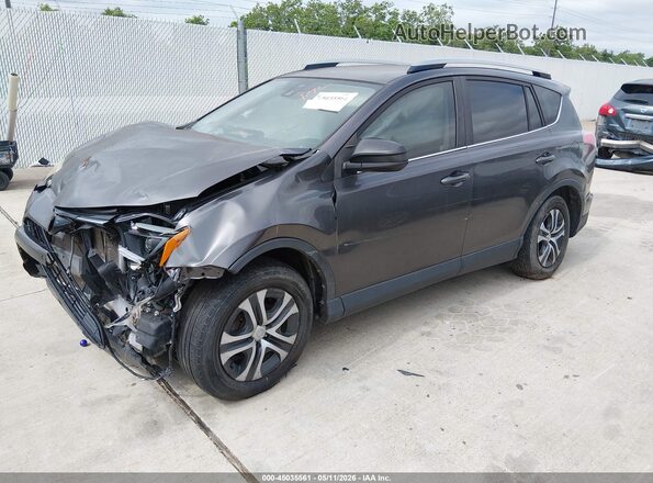 JTMZFREV8HJ715211 2017 TOYOTA LE Gray Vista tres cuartos delantera izquierda
