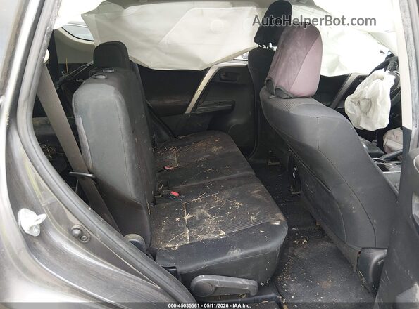 JTMZFREV8HJ715211 2017 TOYOTA LE Gray Vista de la etiqueta del VIN