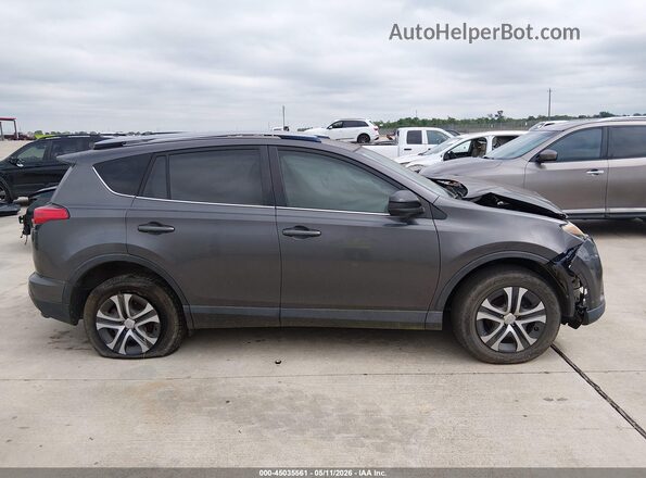 JTMZFREV8HJ715211 2017 TOYOTA LE Gray Vista interior trasera